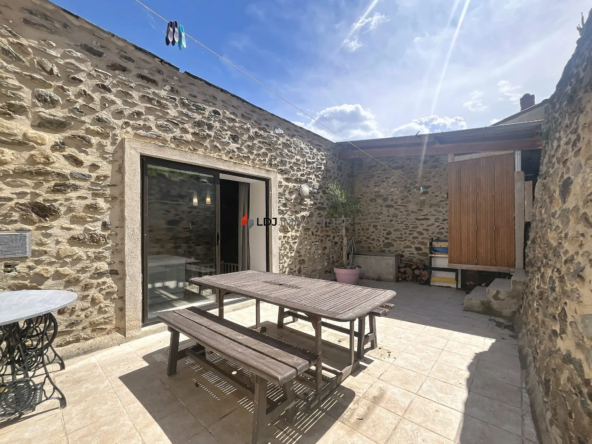 Charmante maison de caractère avec terrasse et potentiel locatif à Olette