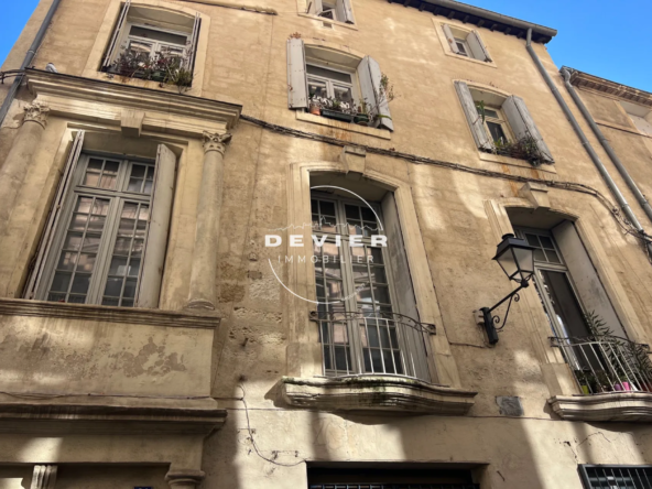 Achat appartement T3 au cœur de Montpellier avec balcon et cheminée