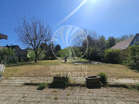 Terrain constructible de 753 m² au centre de Rixheim avec espace naturel