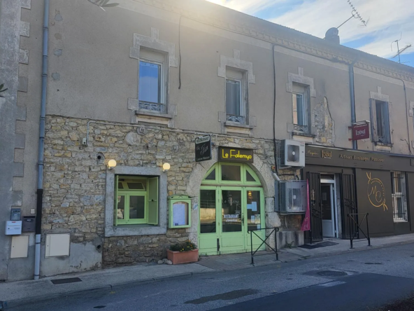 Immeuble locatif avec restaurant et appartement à Ledignan - Investissement rentable