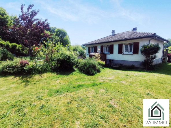 Maison à Pontaumur de 79 m² avec terrasse, garage et cave