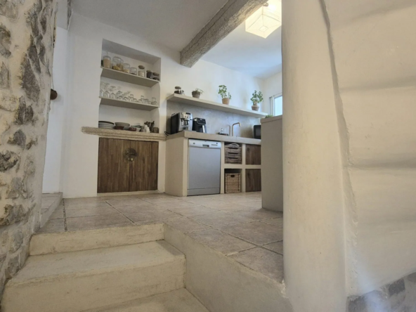 Maison de village en pierre à Combas avec charme authentique