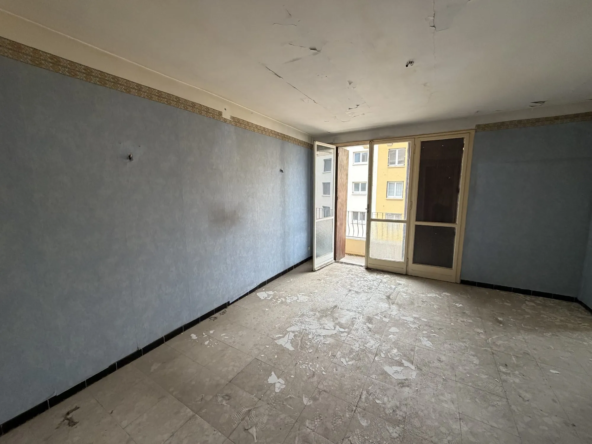 Appartement T3 à rénover à Nîmes proche des Arènes