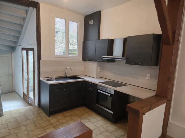 Maison mitoyenne à vendre à Eu - 3 chambres avec cour et chauffage gaz