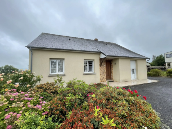 Maison de plain-pied à Châtillon-sur-Colmont avec garage et terrain de 1000 m²
