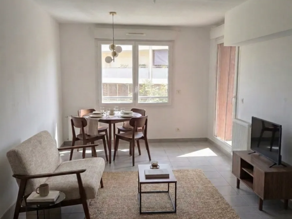 Appartement T2 avec balcon et parking privé à Villeurbanne - Résidence récente