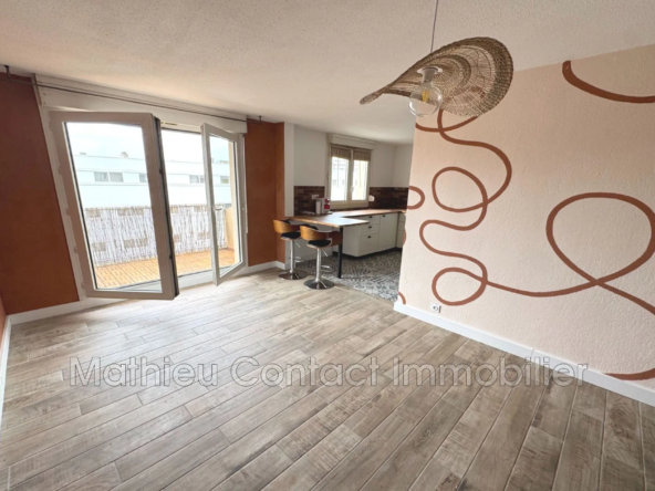 Achat d'un appartement T4 lumineux avec terrasse à Nîmes en centre-ville