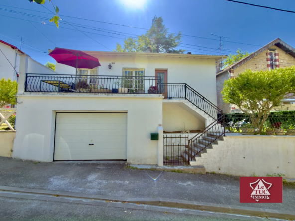 Maison à Fumel avec grand garage, terrasses et espace indépendant