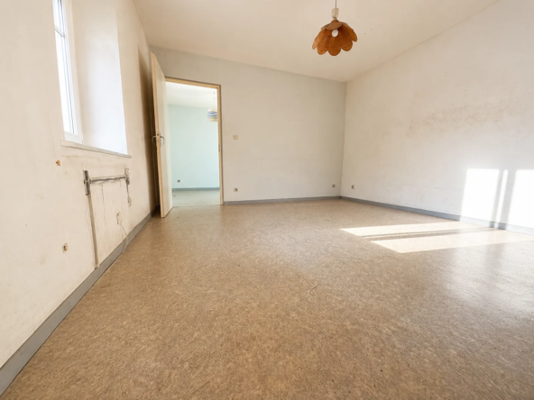 Appartement F2 à Épinal à rénover, proximité du centre et calme absolu