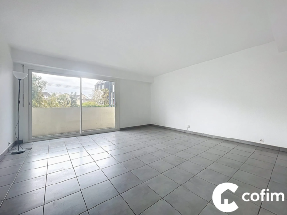 Appartement T4 à Pau avec balcon, cave et proximité centre-ville