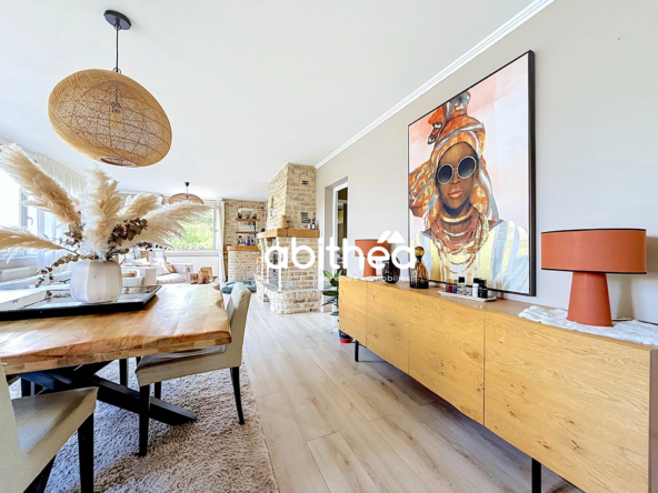 Appartement duplex spacieux de 120 m² à Sainte-Catherine avec parking et environnement calme