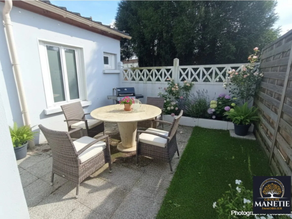 Maison de ville rénovée avec terrasse et garage à Henin-Beaumont