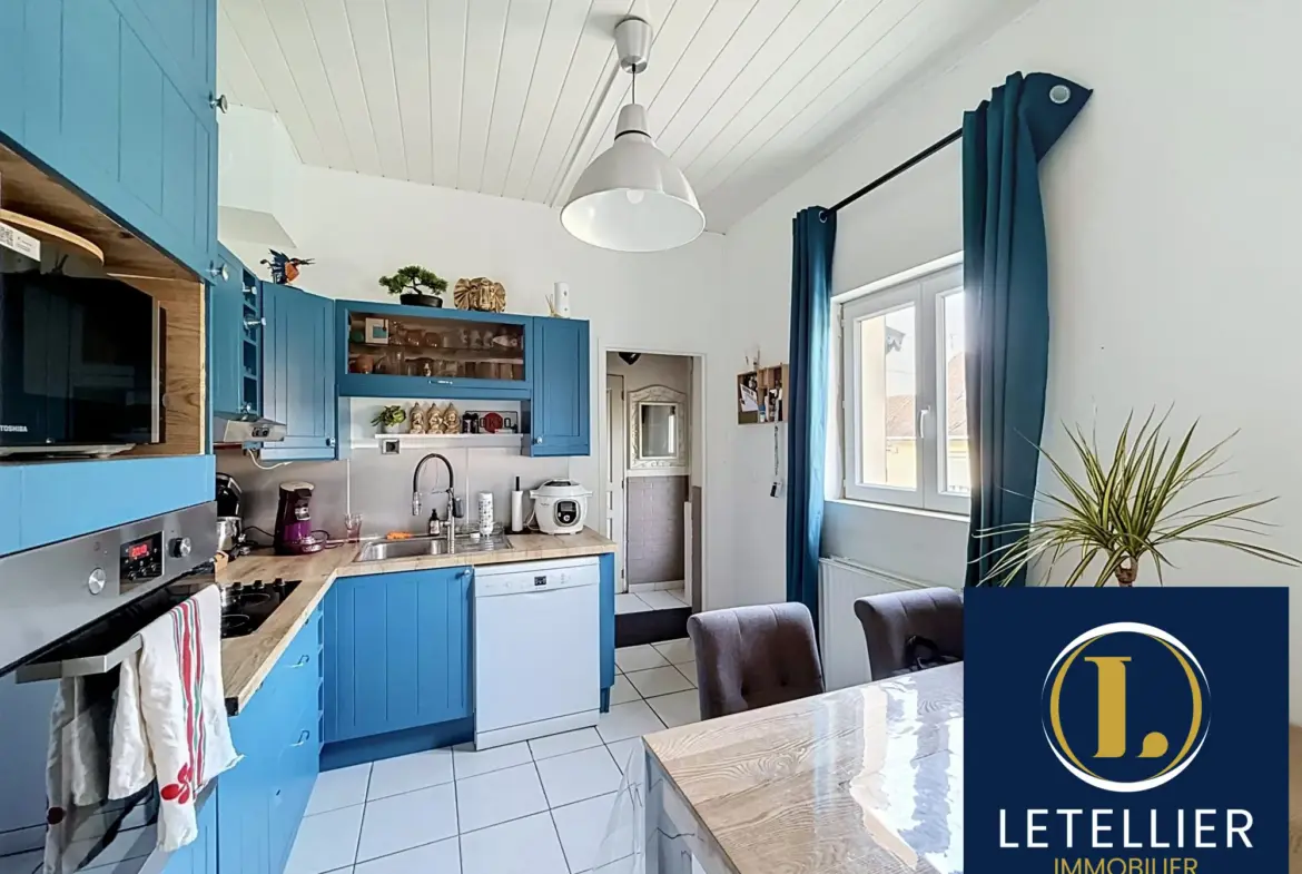 Charmante maison mitoyenne à Saint-Étienne-du-Rouvray avec 2 chambres, terrasse et garage 
