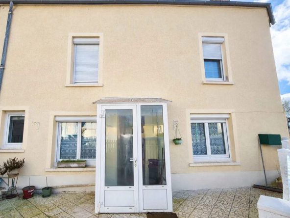 Maison mitoyenne de 104 m² avec jardin à Grainville-Langannerie