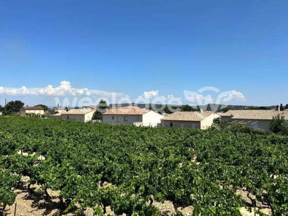 Terrain constructible de 500 m² à Rochefort-du-Gard, environnement calme et privilégié