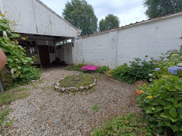 Charmante maison de 72 m² avec grand garage et jardin à Lys-lez-Lannoy