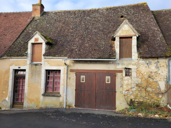 Maison ancienne à rénover avec garage et jardin à Rémalard en Perche