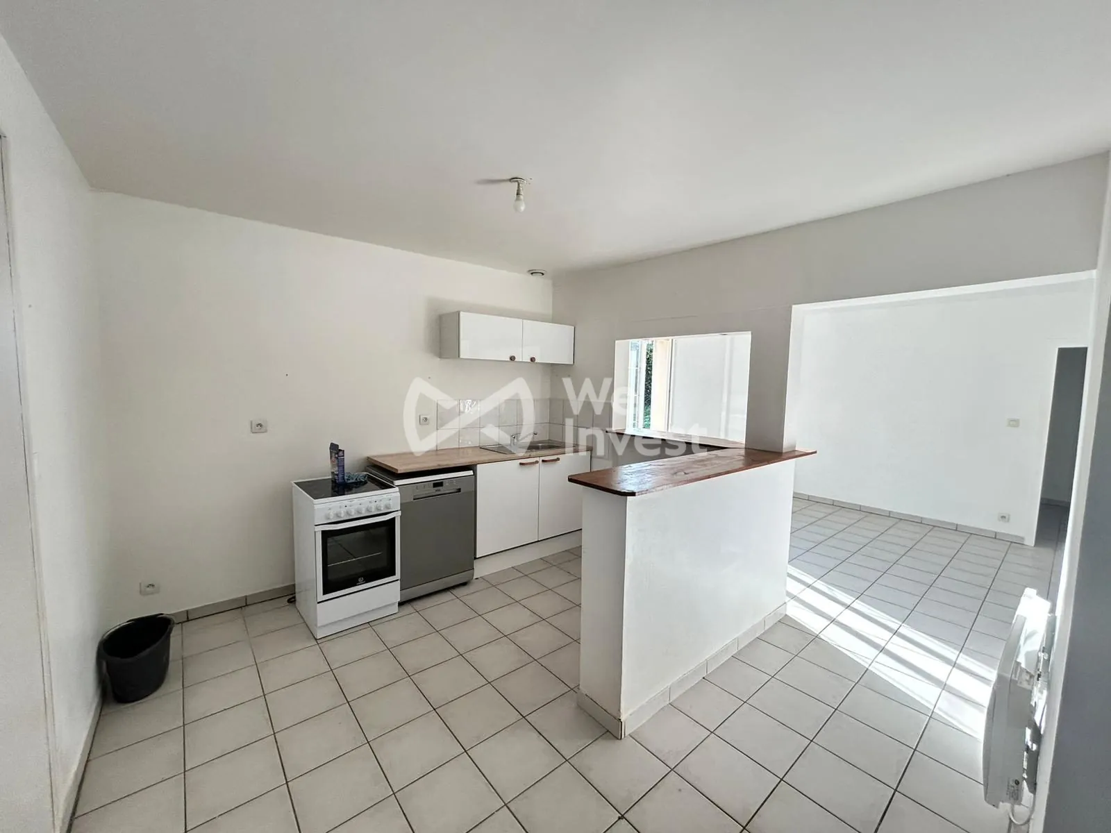 Maison à vendre à Auxerre avec terrain constructible et potentiel locatif élevé