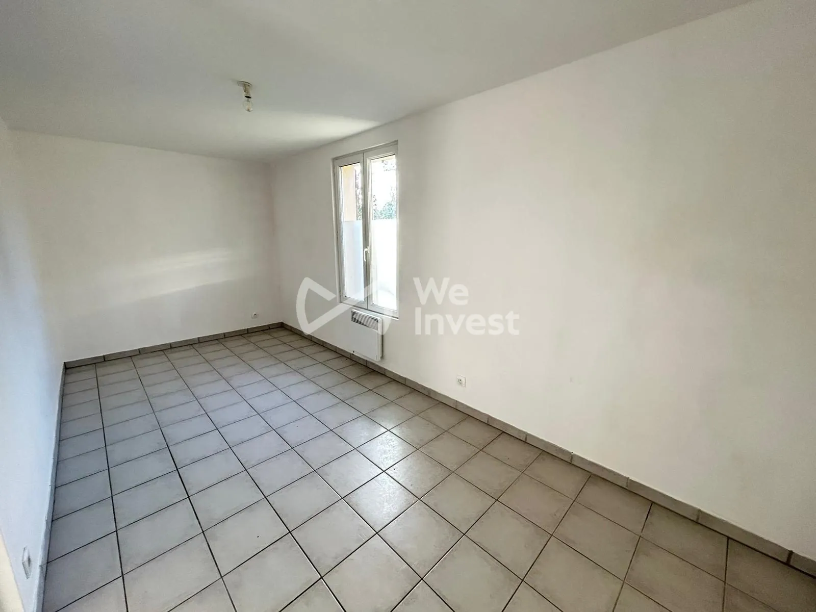 Maison à vendre à Auxerre avec terrain constructible et potentiel locatif élevé 