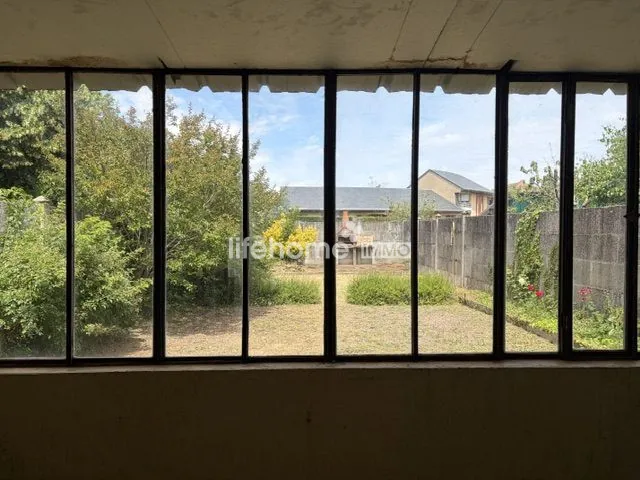 Maison de bourg à Saint-Maur avec jardin, garage et potentiel de rénovation