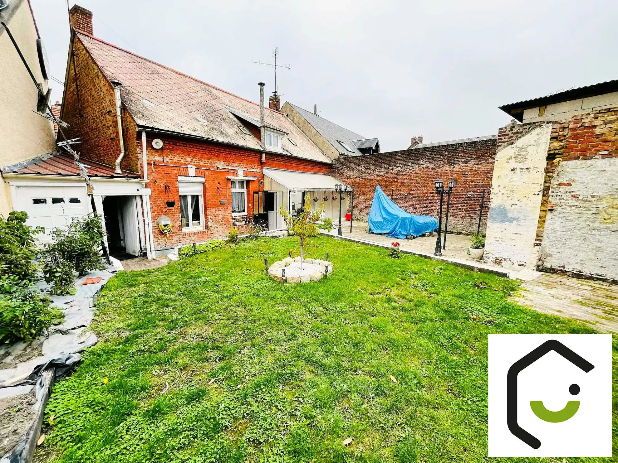 Maison à vendre à Eppeville - Charmante maison mitoyenne avec jardin et garage
