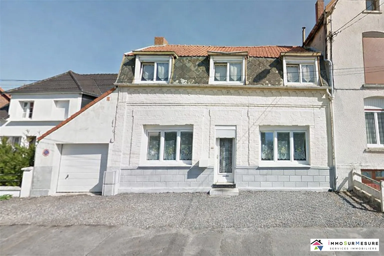 Maison de ville avec jardin, garage et terrasse à Saint-Michel-sur-Ternoise enviée pour sa localisation