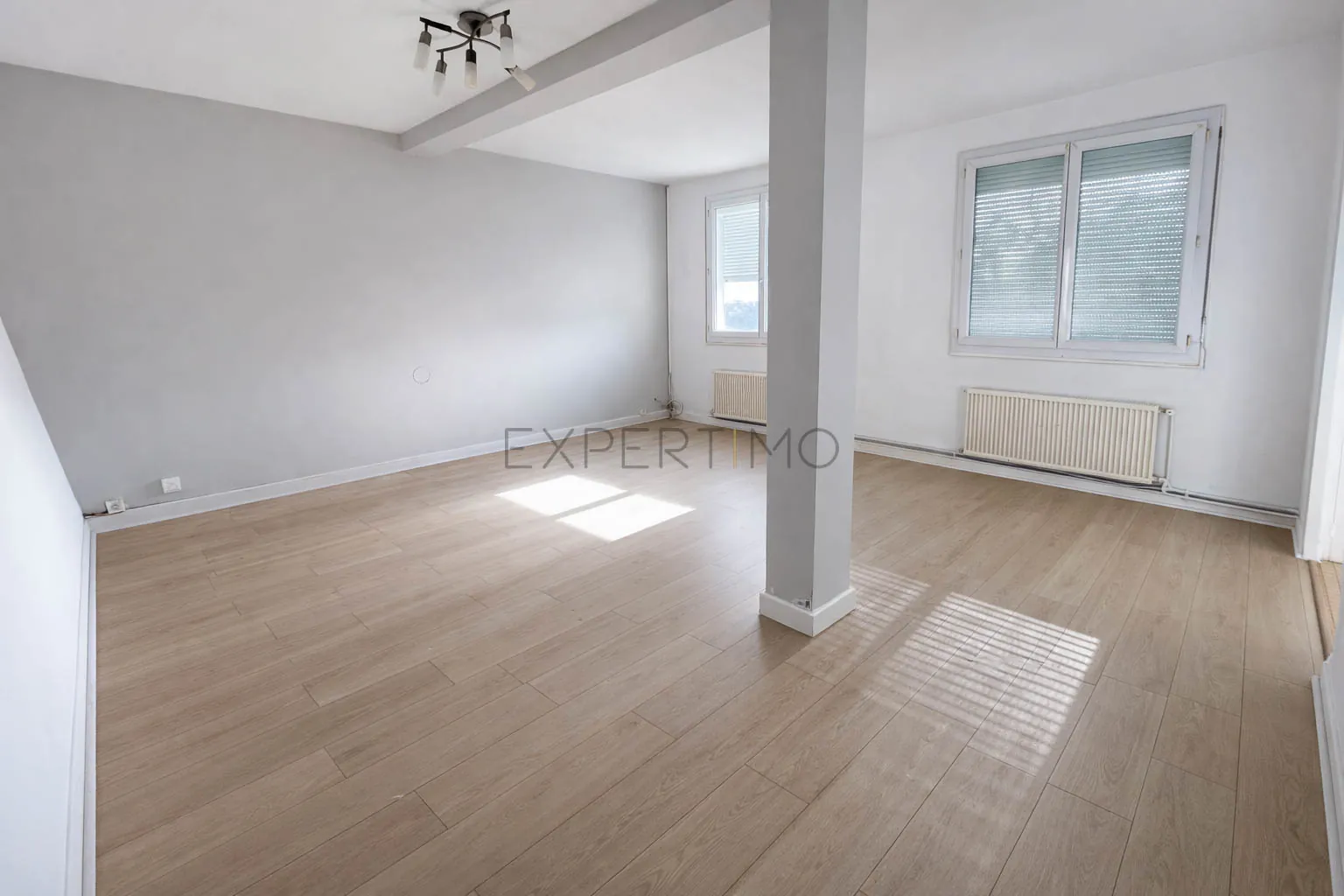Appartement 3 pièces de 66 m² au centre de Saint-Nazaire avec jardin et grenier
