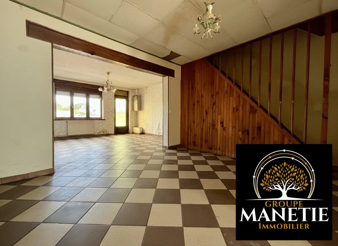 Maison à vendre à Cuincy avec 2 chambres, jardin et potentiel de rénovation