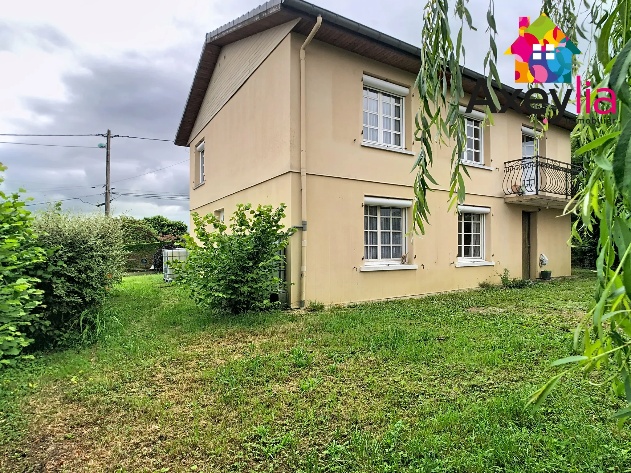 Maison à vendre à Charlieu - 4 chambres, garage et terrain arboré