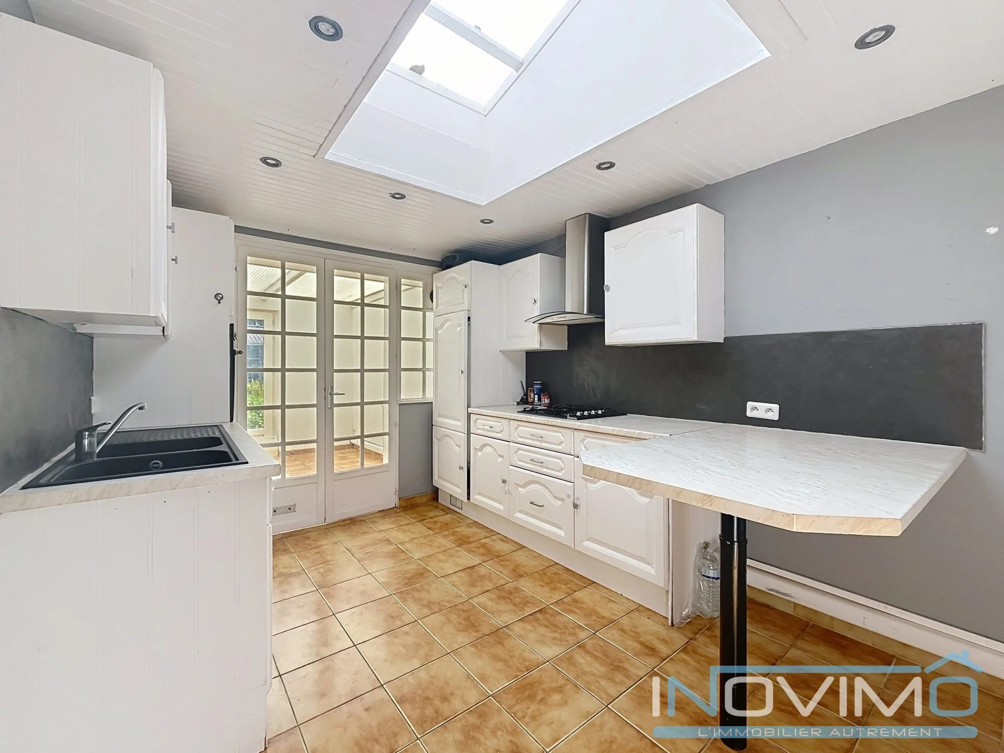 Maison à vendre à Saint-Sylvestre-Cappel avec garage et jardin