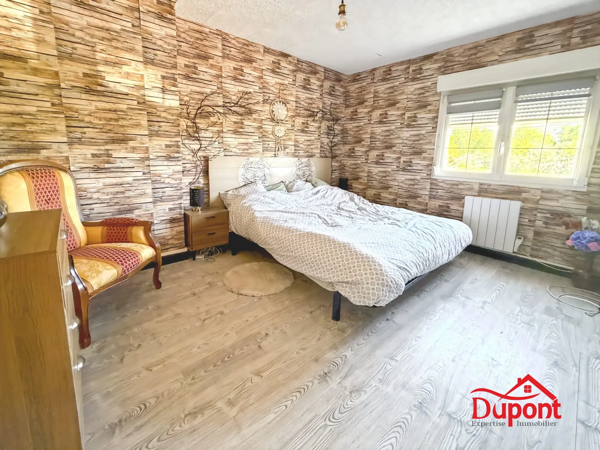 Maison mitoyenne à vendre à Iwuy – 100 m² avec jardin et terrasse 