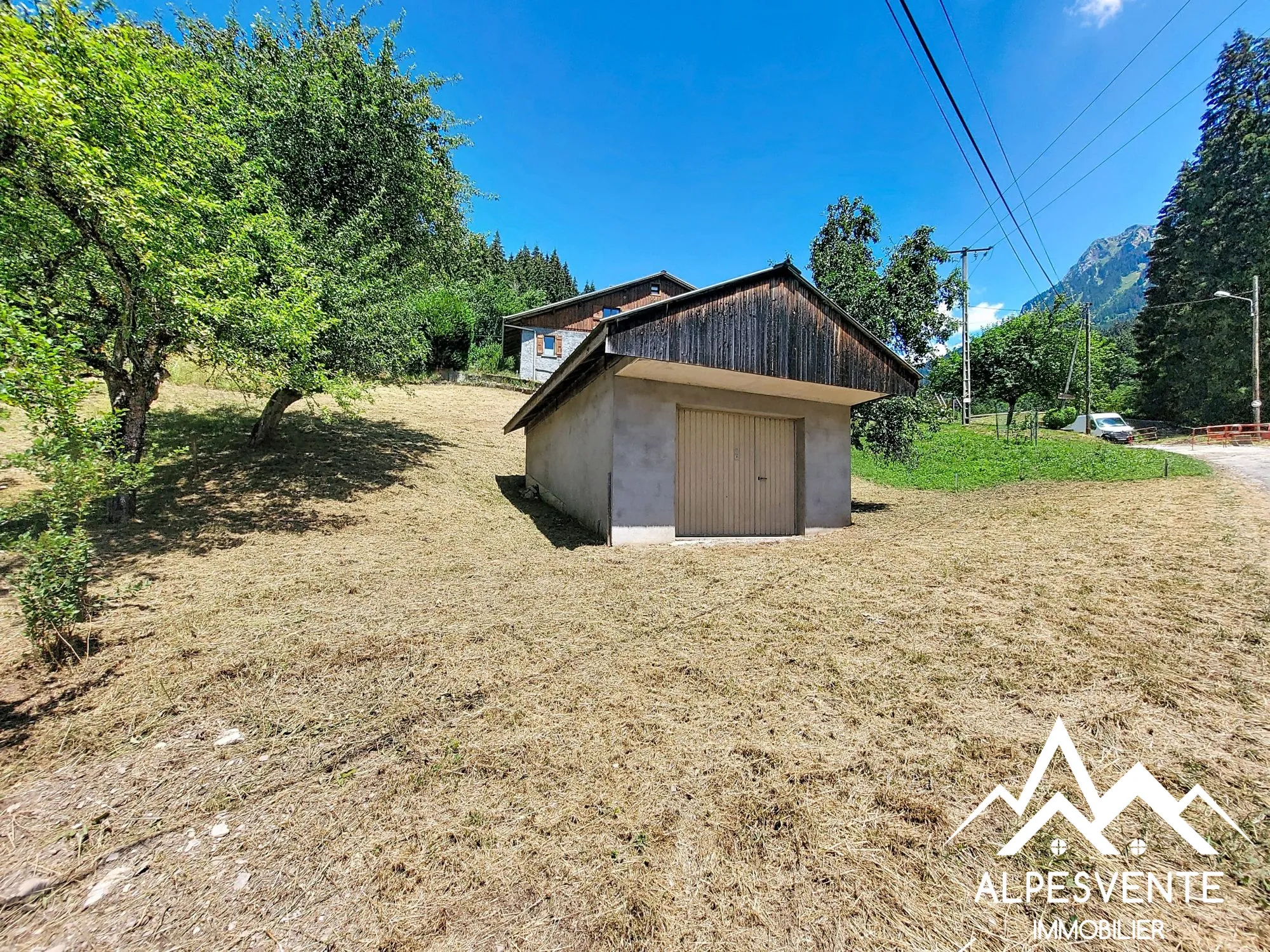 avendre_terrain_constructible_garage_stjeandaulps_alpesvente Terrain constructible à vendre à Saint Jean d'Aulps avec garage et vue sur les montagnes