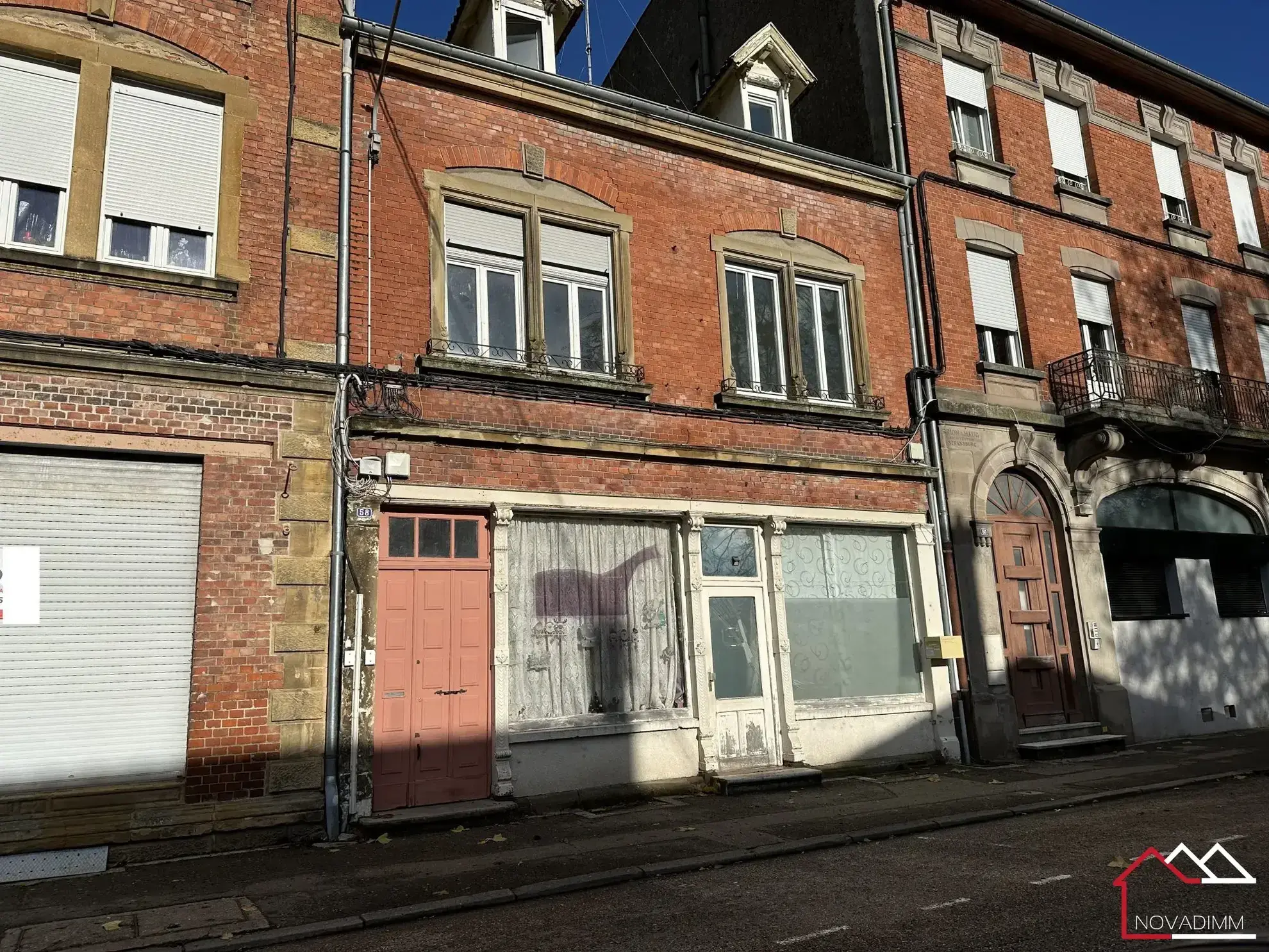 Immeuble à Morhange avec deux appartements loués et forte rentabilité