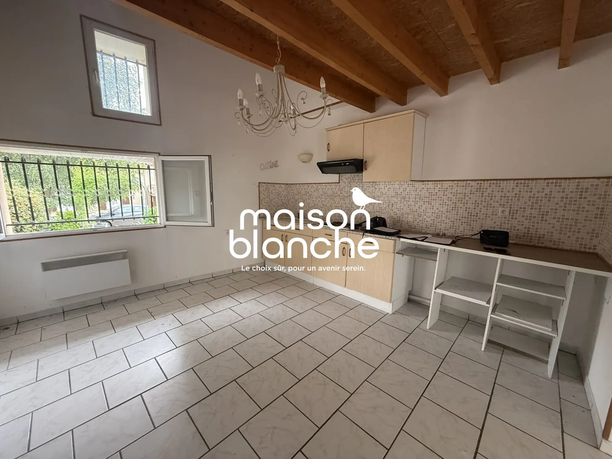 Maison de 92 m² avec 2 chambres, jardin et garage à Orignolles 
