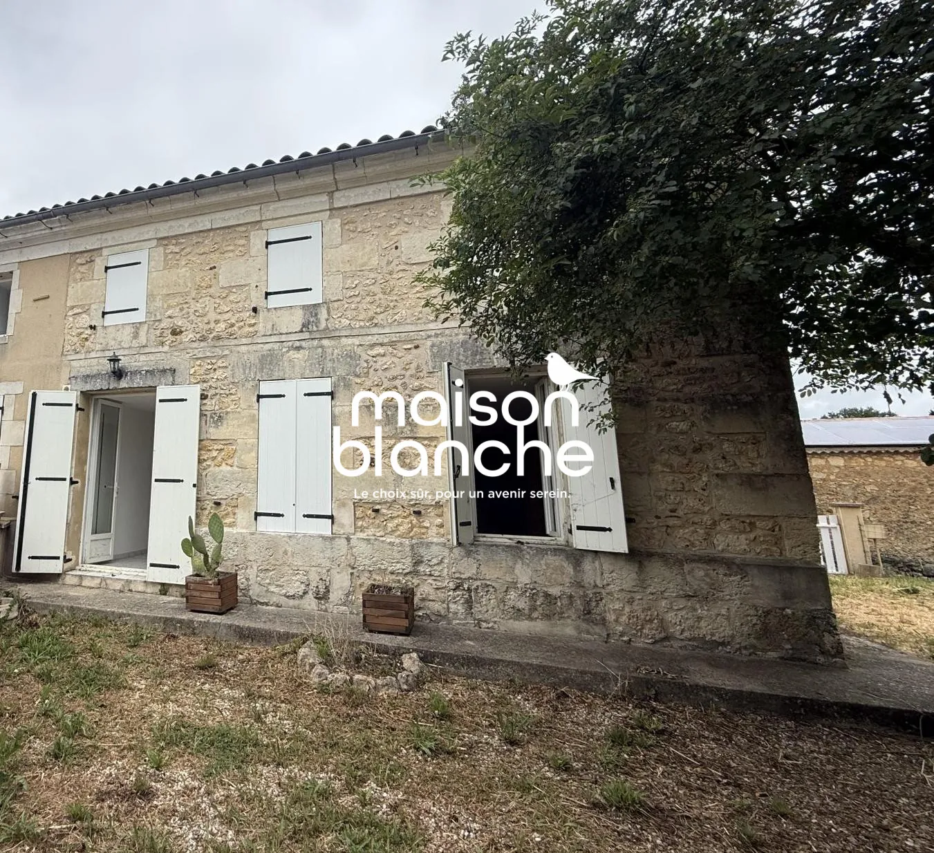 Maison de 92 m² avec 2 chambres, jardin et garage à Orignolles