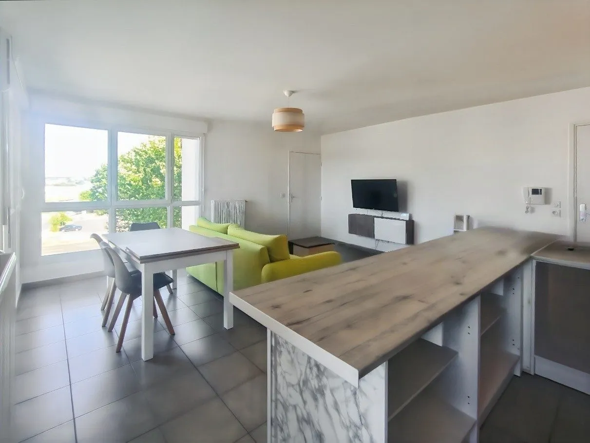 À vendre appartement lumineux avec balcon et garage à Villefranche-sur-Saône