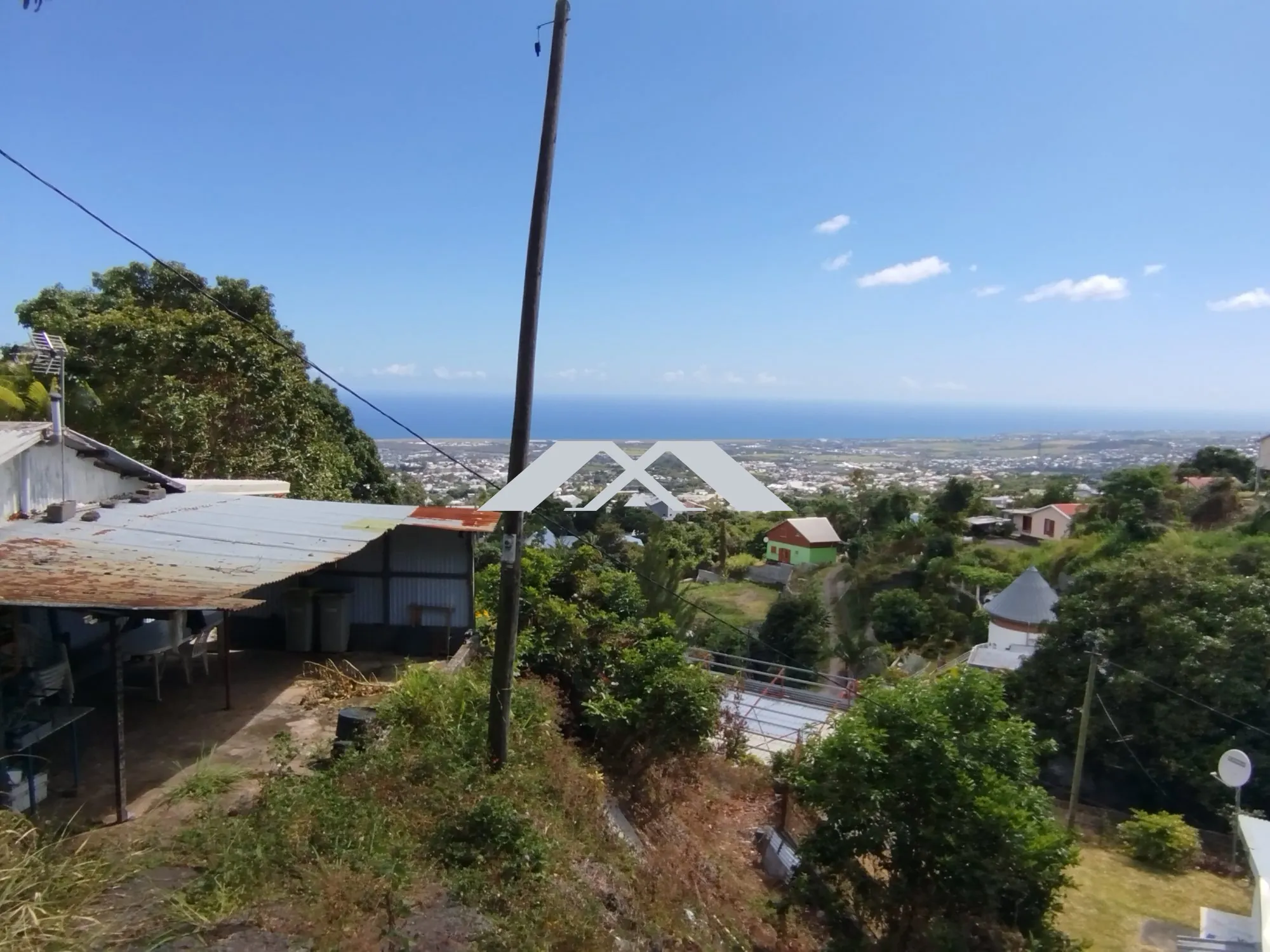 Terrain de 590 m² à Sainte Clotilde, opportunité d'investissement et de construction