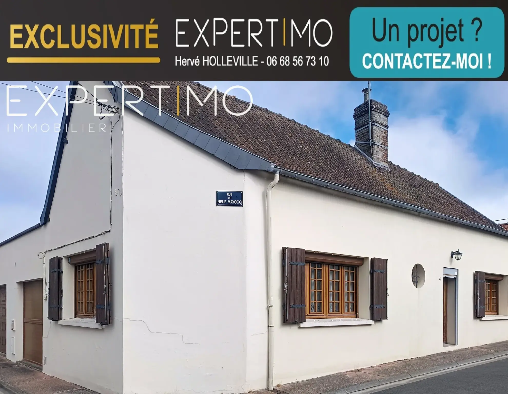 Maison avec garage et terrasse spacieuse en centre-ville