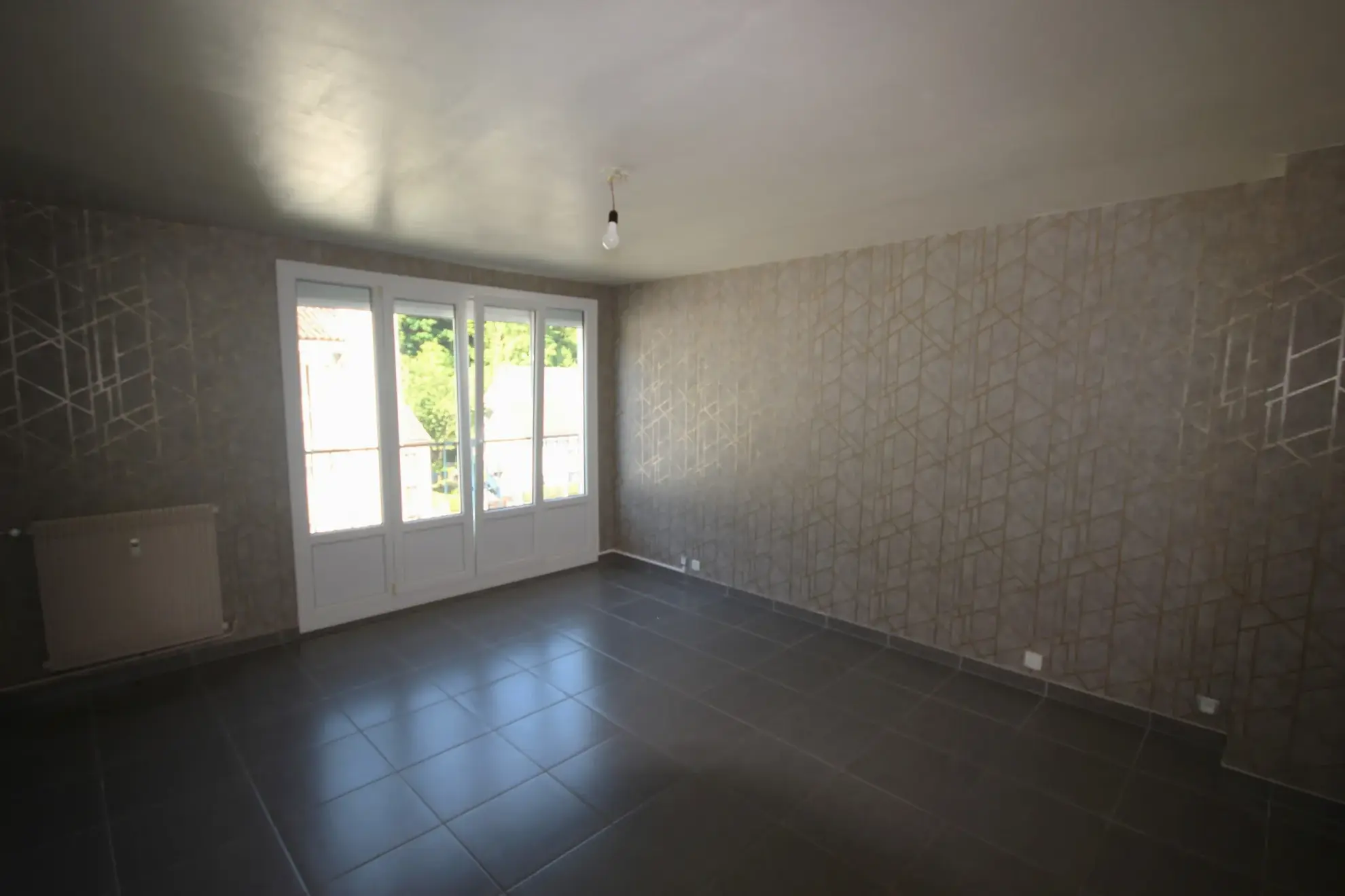 A vendre appartement T4 rénové à Givet, proche frontière belge – idéal premier achat ou investisseur
