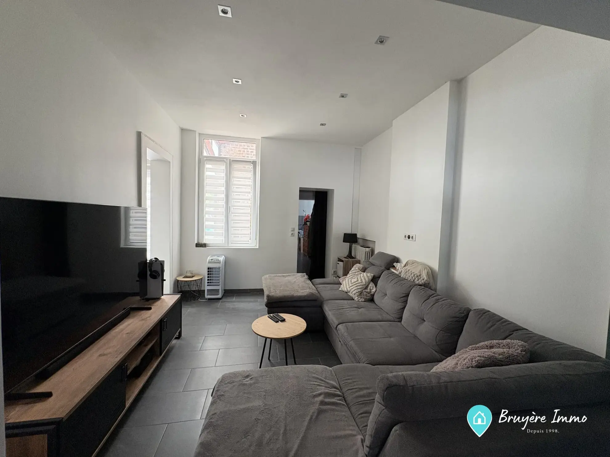 Maison à vendre à Fourmies proche du centre-ville – 3 chambres, garage et véranda