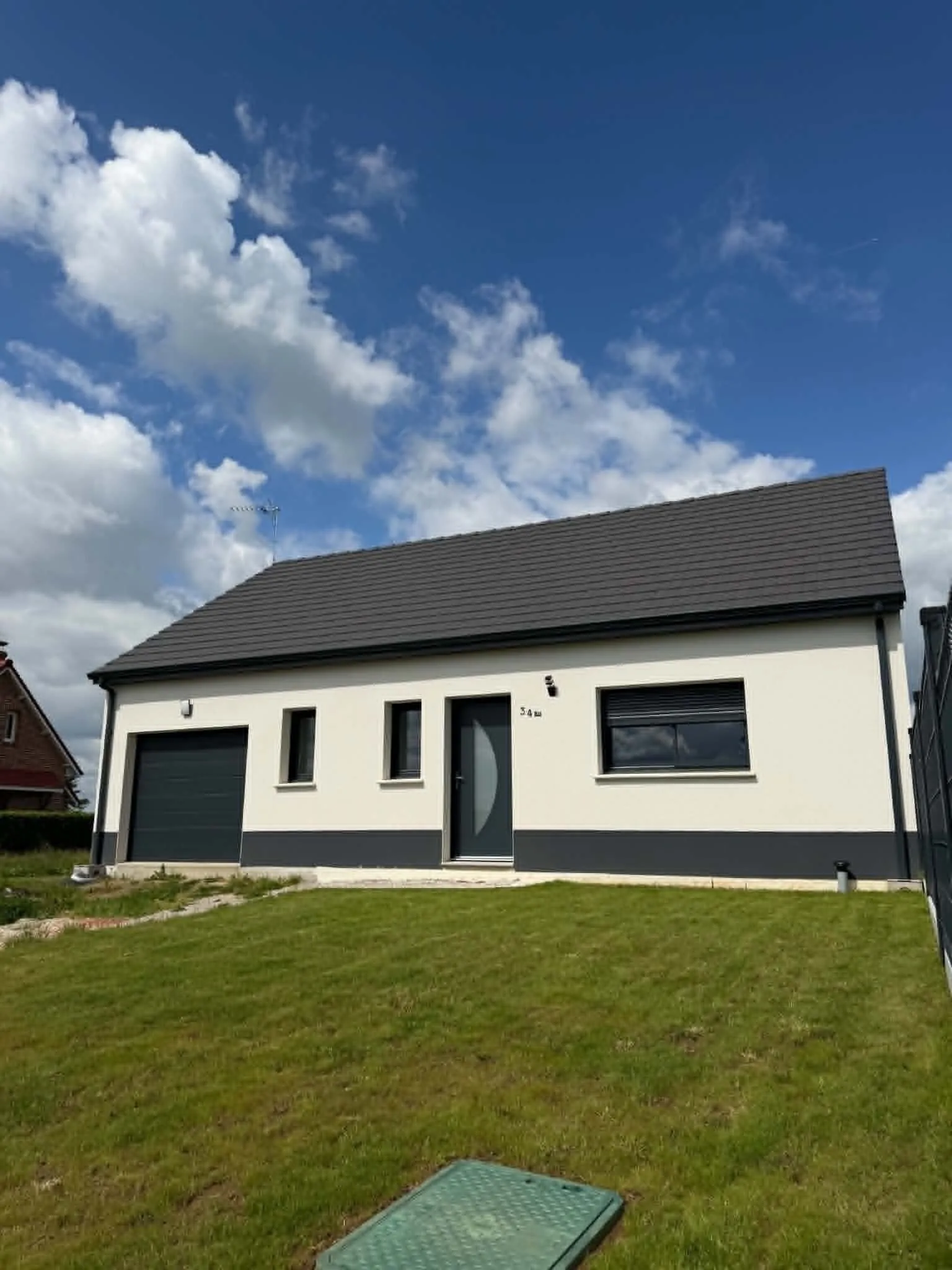 Maison neuve à Vecquemont avec 3 chambres, garage et conformité RE2020