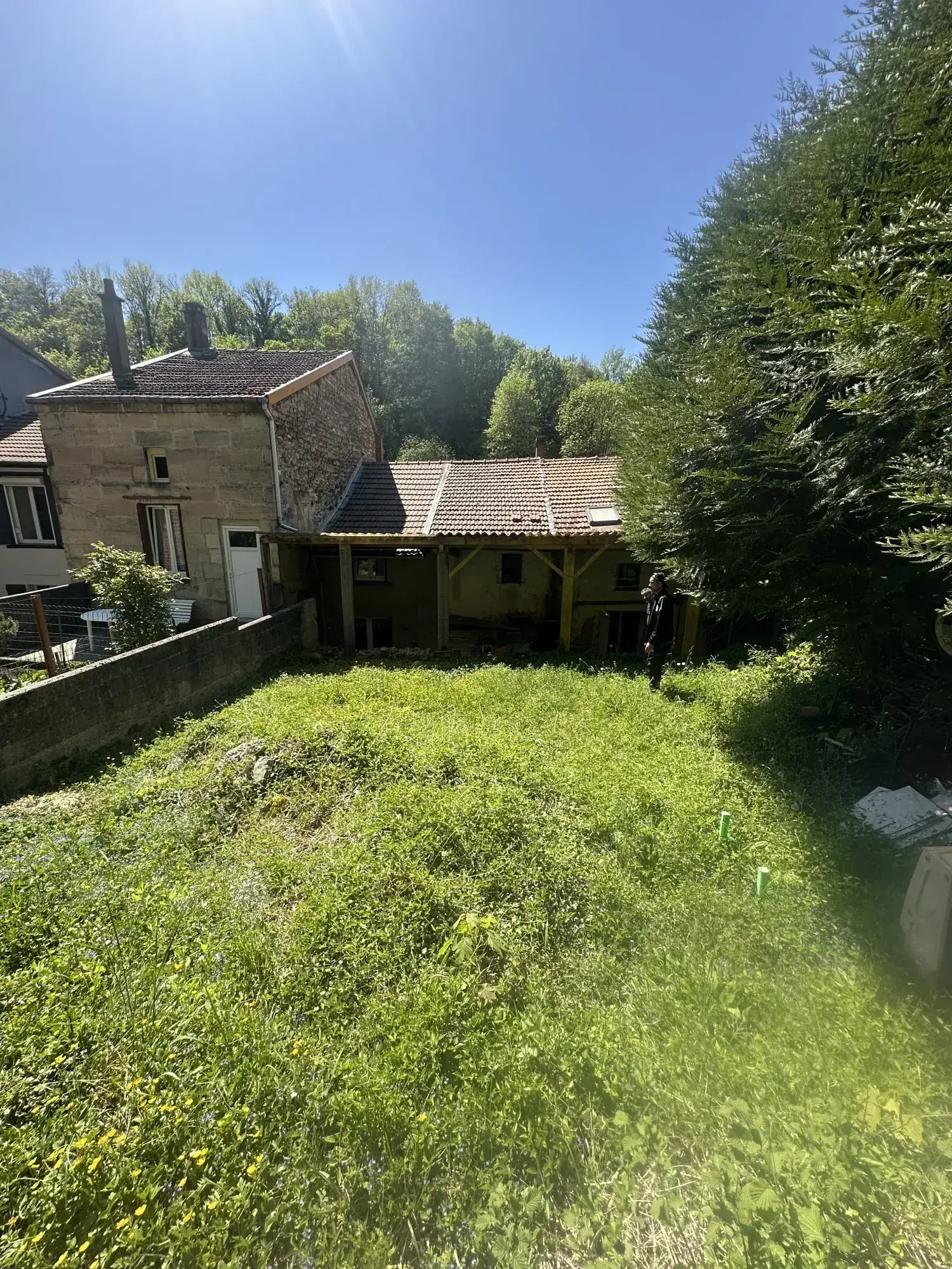 Maison de ville à vendre à Bar-le-Duc avec jardin et potentiel de rénovation