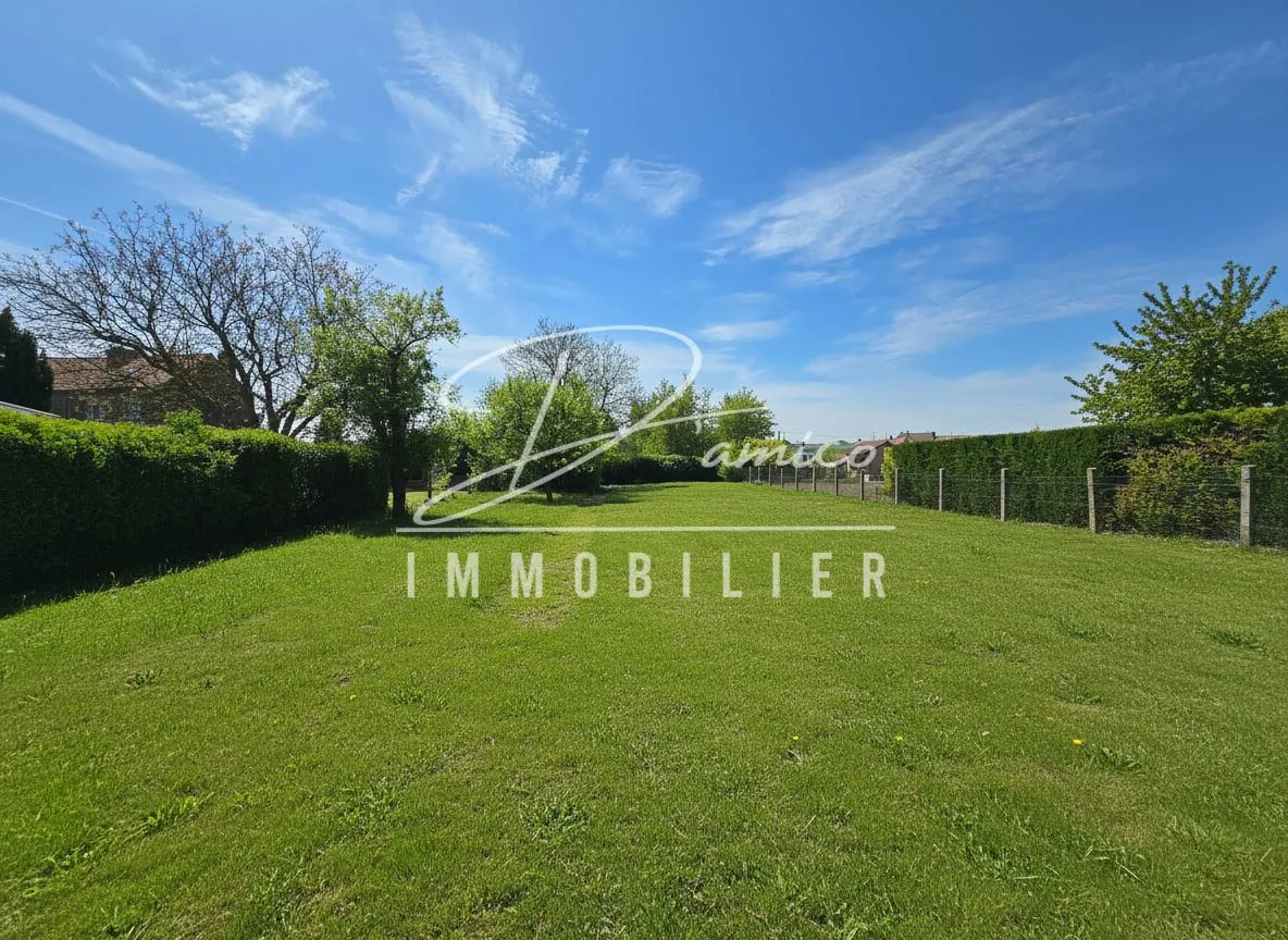 Terrain constructible de 1000 m² avec accès privé à 10 min de Cambrai