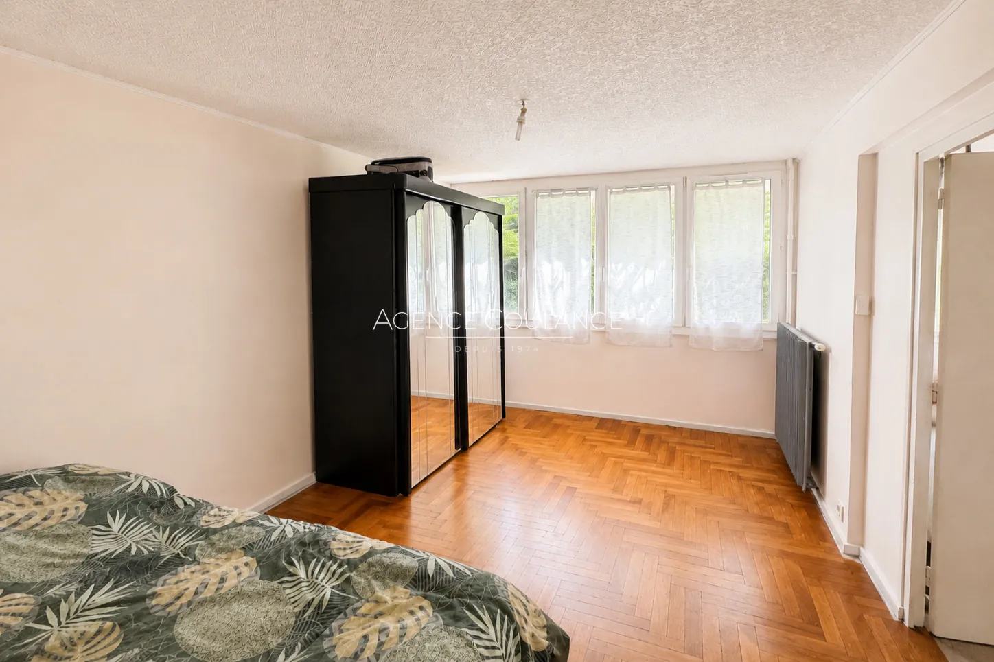 Charmant appartement T2/T3 de 64 m² à Sainte-Foy-lès-Lyon avec parking et cadre arboré 