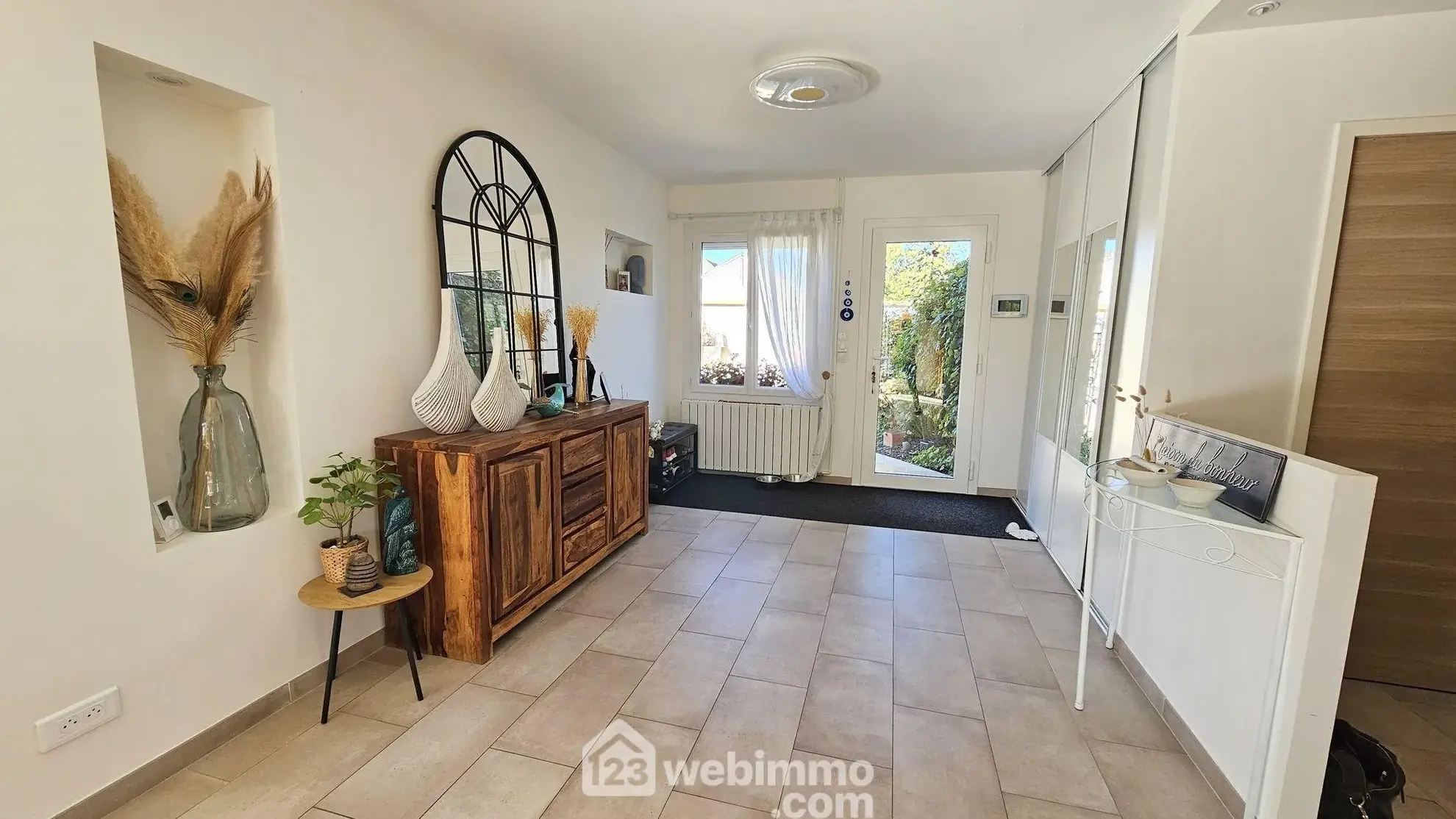 Belle maison rénovée de 116 m² à Milly-la-Forêt avec garage et terrasse 