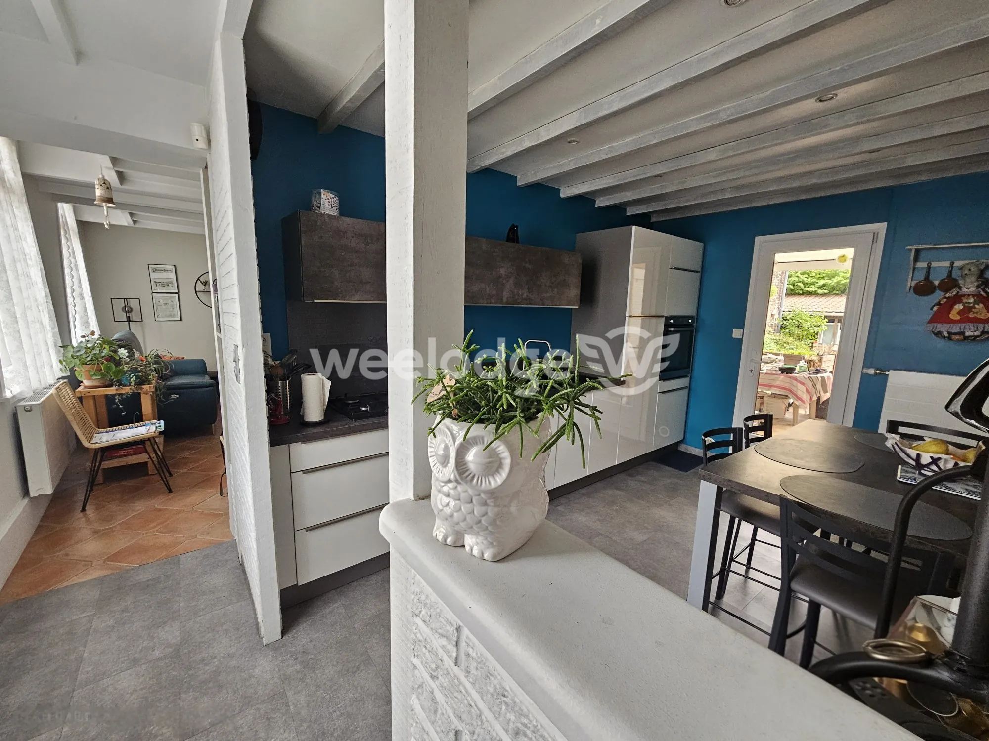 Charmante maison à Anzin avec jardin et espace intérieur optimisé