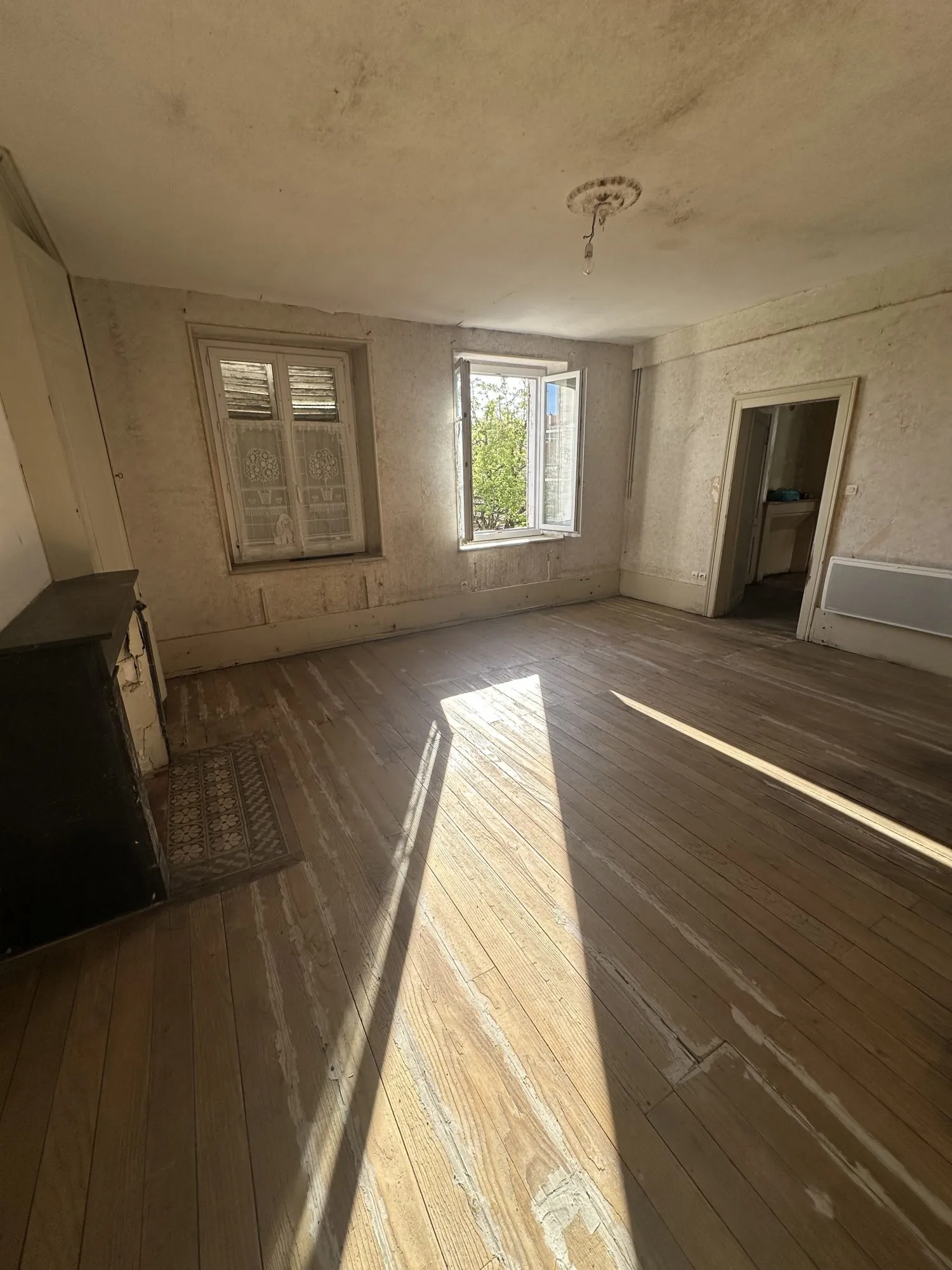 Maison de ville en pierre à vendre à Bar-le-Duc, centre-ville, potentiel locatif élevé