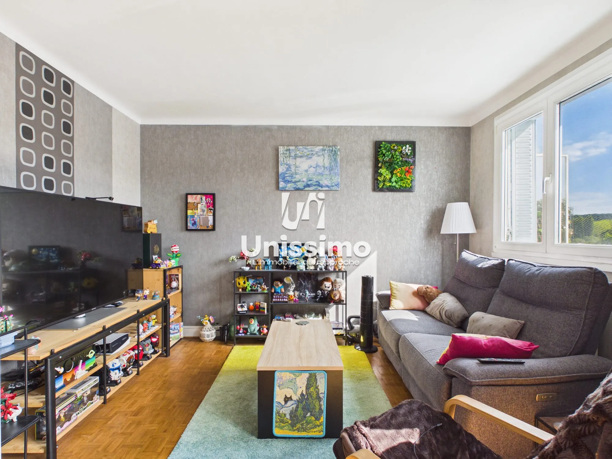 Appartement T4 rénové à Montbéliard avec balcon, garage et cave