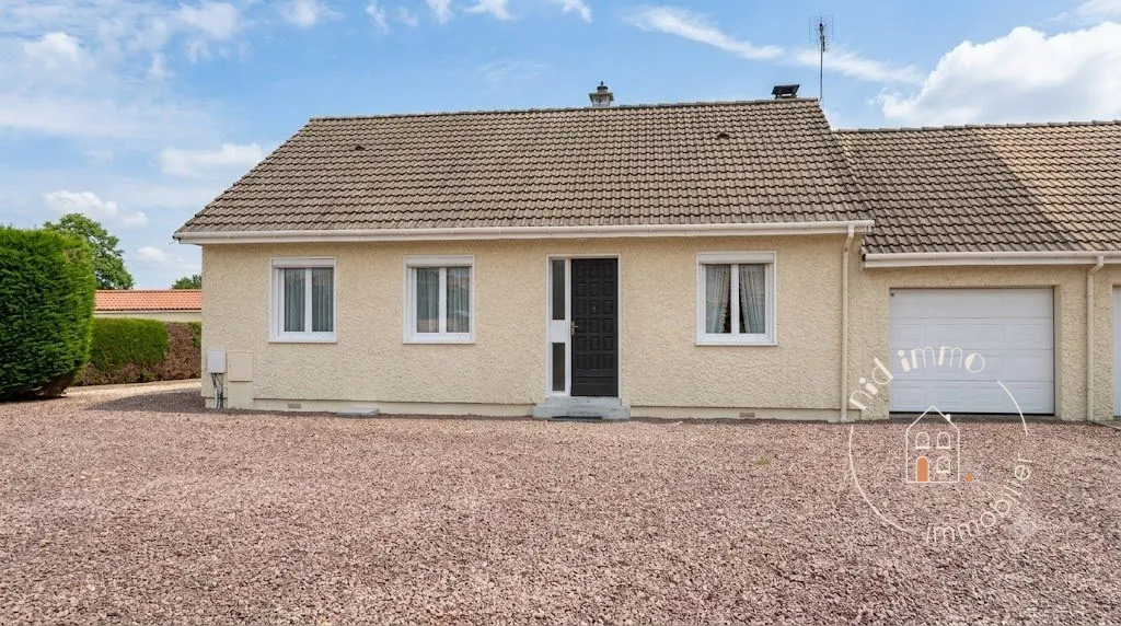 Maison de plain-pied avec jardin, garage et commerces à proximité à Lieurey