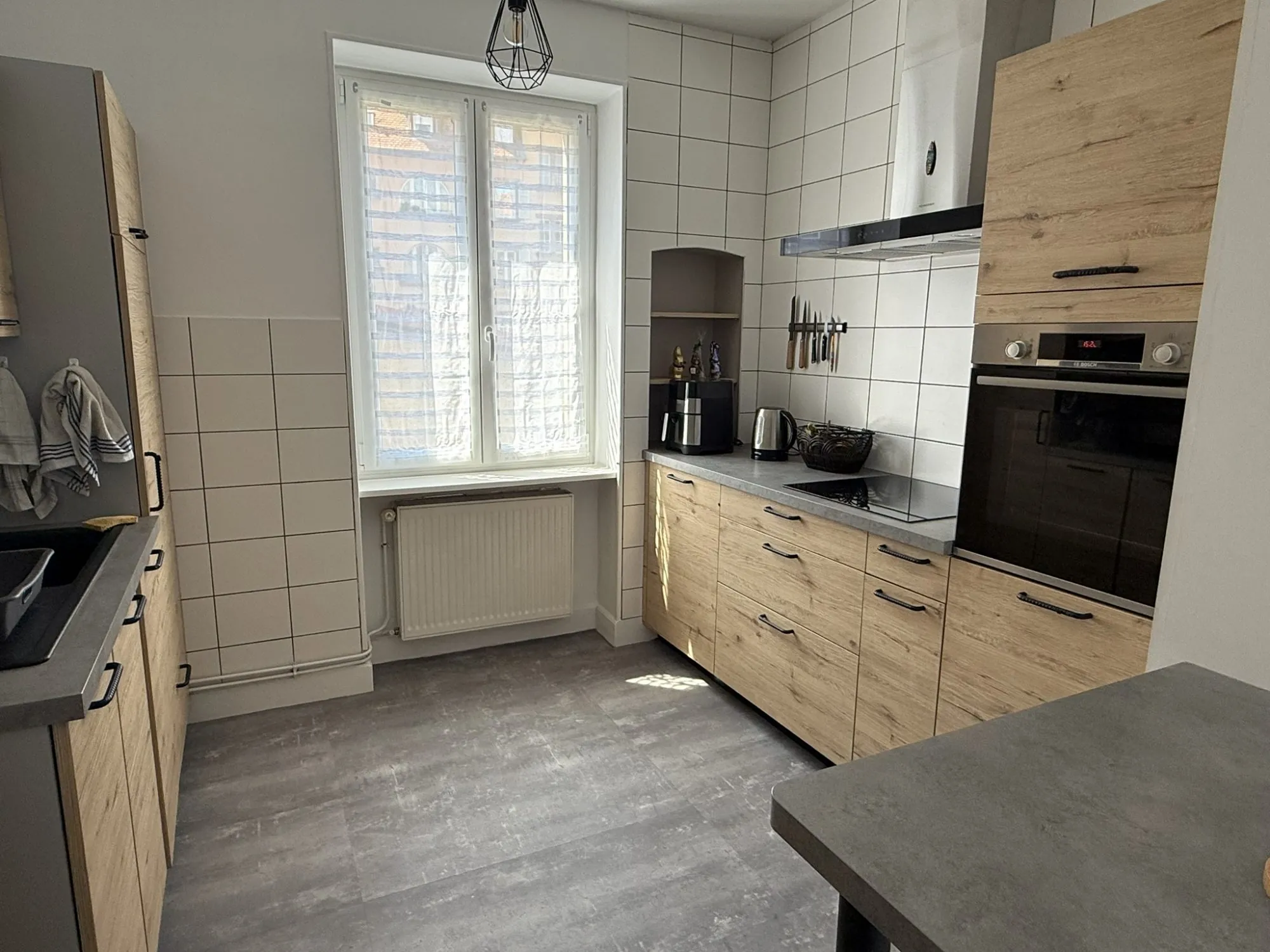 À vendre à Colmar, appartement 3 pièces rénové avec cave et jardin, idéalement situé près du centre-ville et de l’université